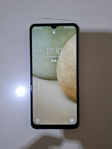 флай раскладушка телефон: Samsung Galaxy A12, 2 ГБ, цвет - Синий, Сенсорный, Отпечаток пальца, Две SIM карты