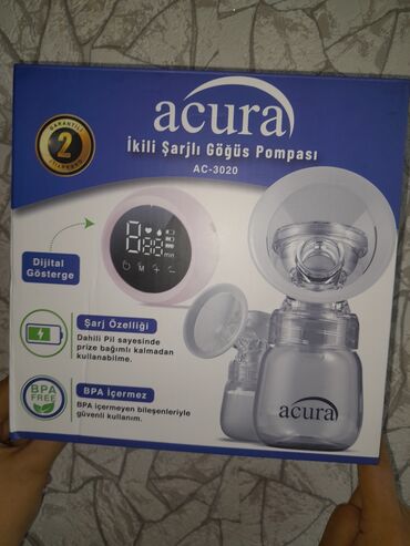 yuxuda sud gormek: Acura ikili şarjlı süd pompası. Daxili batareyası sayəsində prize