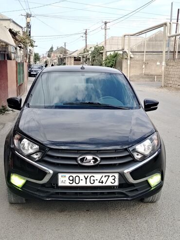 ваза стеклянная прозрачная высокая без узора: VAZ (LADA) Granta: 1.6 l | 2024 il 27000 km Sedan