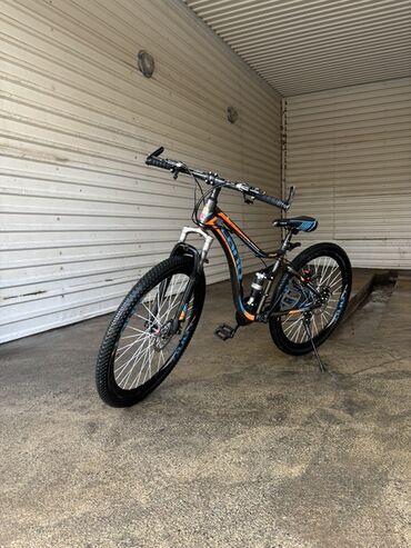 İdman velosipedləri: Ön asqılı, disk əyləcləri və möhkəm çərçivəsi olan dağ velosipedi — 2