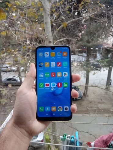 Xiaomi: Xiaomi Redmi 7, 16 GB, rəng - Qara, 
 Barmaq izi