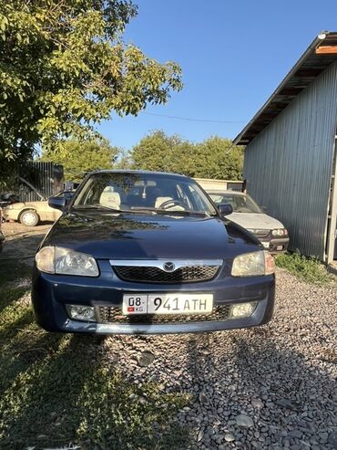 машины за 6000 долларов: Mazda 323: 2000 г., 1.5 л, Механика, Бензин, Хетчбек
