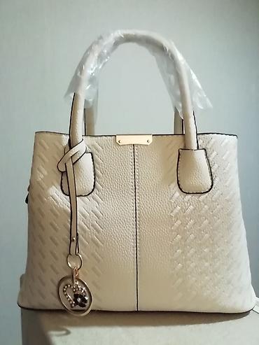 caprice koferi: Nova prelepa bež tašna dužine 30cm i visine 22cm. 3 pregrade unutra — 3