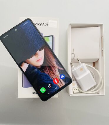 satılan telefonlar: Samsung Galaxy A52, 128 GB, rəng - Göy, Barmaq izi, İki sim kartlı, Face ID