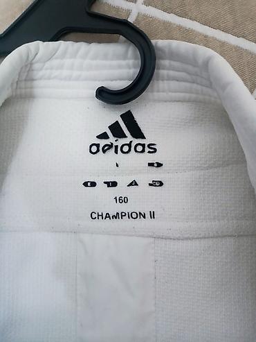 коленный: Кимоно для дзюдо adidas Champion II, - Бренд: adidas - Модель — 2