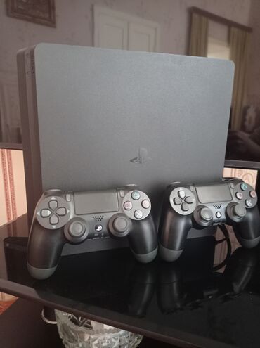 PS4 (Sony Playstation 4): Salam PlayStation 4 slim satılır 
2pult 
7oyun
vp yazın