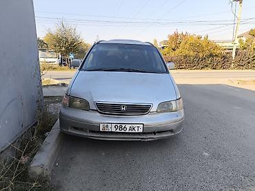 одиссей 1998: Honda Odyssey: 1996 г., 2.2 л, Автомат, Бензин, Минивэн — 1