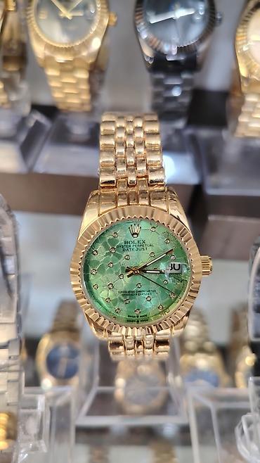 Məhsul: Kvars mexanizmli dəbli saatlar (klassik “Datejust” üslubunda)