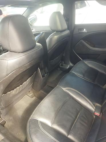 avtomobil qızdırıcı: Kia Optima SXL – biznes sinfi sedan - Korpusu: qara rəng, SXL paketi — 3