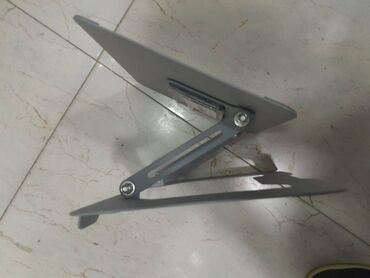 Masaüstü dəstlər: Noutbuklar üçün stolüsdü 360 dərəcə dönən tutacaq satılır. Möhkəm — 9