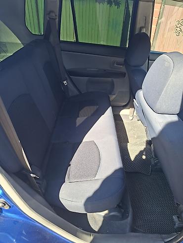 low ll: Mazda Demio: 2003 г., Автомат — 9