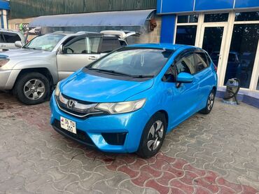 решетка радиатора на хонда фит: Стильный синий хэтчбек Honda Fit, идеально подходящий для городских