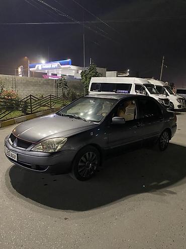 Mitsubishi: Mitsubishi Lancer: 2005 г., 1.6 л, Механика, Бензин, Седан — 2