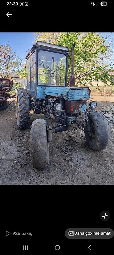 t 25 traktor satisi: Traktor t 28 tipli, kabinəli, mavi rəng. - Ön-arka təkər — 2