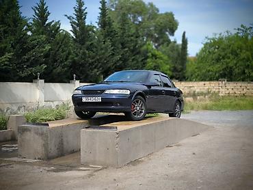 Opel: Opel Vectra B sedan - Kuzov: 4 qapılı sedan, tünd göy rəng - Mühərrik — 7
