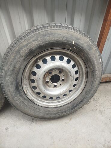 шины для нексии: Продам запаску размер 205/70 R15 в хорошем состоянии,Зима !!!