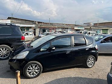 uni 260b: Honda Jazz: 2009 г., 1.3 л, Механика, Бензин, Хэтчбэк — 3