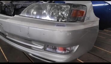 ипсум рестайлинг: Передний Бампер Toyota 2000 г., Новый, цвет - Белый, Оригинал