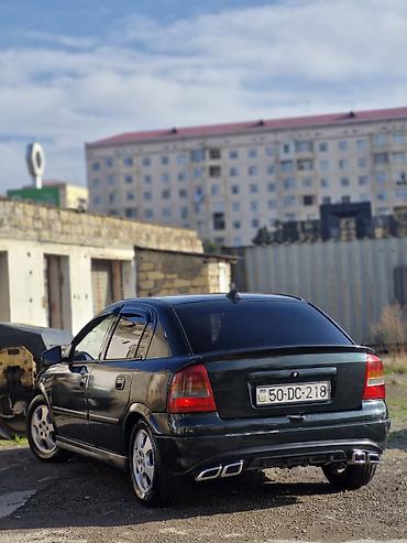 Opel: Model: Opel Astra G sedan Kuzov: 4 qapı, tünd yaşıl rəng Mühərrik və — 8