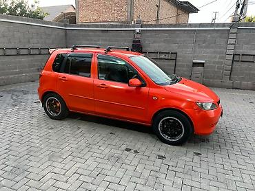 Mazda Demio: 2003 г., 1.3 л, Автомат, Бензин, Хэтчбэк
