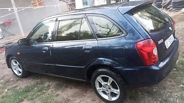 subaru legaci: Mazda 323: 2002 г., Универсал — 3