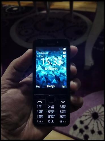 islenmis telefonlar qiymetleri: Nokia XR30, цвет - Черный — 1