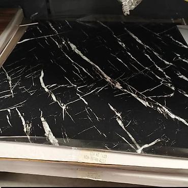 Ostalo: Podne obloge gumirane 
Samolepljive 
Cena po komadu 350 din
60*60cm — 6