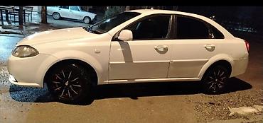 Daewoo: Sedan avtomobil – ağ rəng Model:tipli 4 qapılı sedan Kuzov: ağ rəng — 2