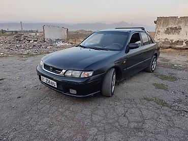 12 t: Mazda 626: 1997 г., 1.8 л, Механика, Бензин, Седан — 3