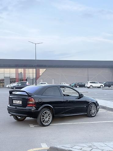 Opel: Model: Opel Astra G Coupe (3 qapı) Rəng: qara Kuzov: hetçbek/kupeli 3 — 11