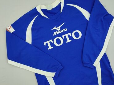 Niebieska koszulka sportowa z długim rękawem marki Mizuno, ozdobiona
