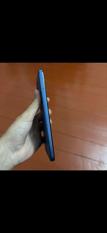 Техника и электроника: Məhsul: Smartfon (mavi gövdə) Təsvir: - Korpus: Düz kənarlı, mavi — 4