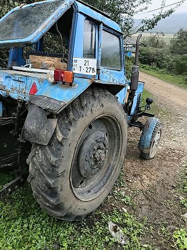 təkər ölçüləri: Minsk MTZ seriyasından mavi traktor - Güclü dizel mühərrik, ön tərəfdə — 3