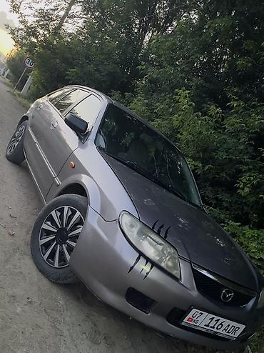 Mazda: Mazda Familia: 2003 г., 1.6 л, Кол менен иштөөчү, Бензин, Седан — 5