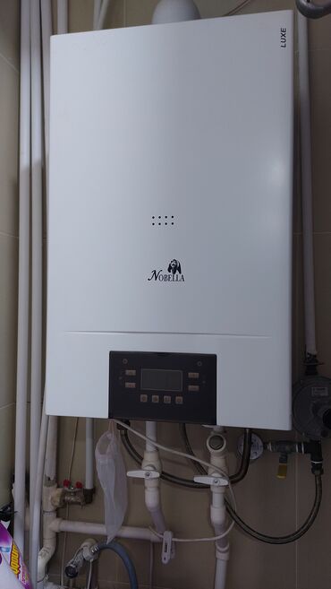 Elektrikli qızdırıcılar və radiatorlar: Nobella brendinə məxsus 30 kv kombi.Az islenib.Ideal veziyyetdedir