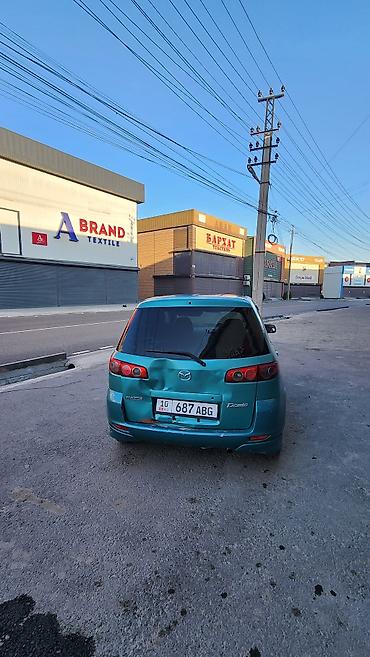 мотоботы черные: Mazda Demio: 2002 г., Автомат, Бензин, Хэтчбэк — 3