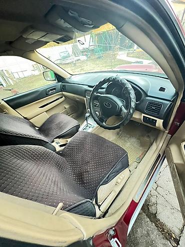 Subaru: Subaru Forester: 2004 г., Бензин — 7