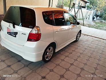 100 с4: Honda Fit: 2004 г., 1.3 л, Автомат, Бензин, Хэтчбэк — 7
