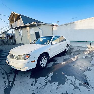 diska 13: Nissan Sunny: 2002 г., Автомат, Бензин, Седан — 10