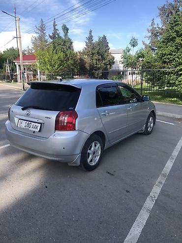 Toyota Corolla: 2003 г., 1.5 л, Автомат, Бензин, Хэтчбэк — 2