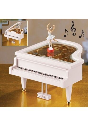 oyuncaq piano: Mucru.Bezek esyaları saxlama qabı. pıano formasında.yenıdır
