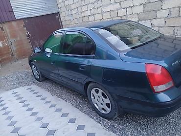 orta panel: Hyundai Elantra: 2 l | 2003 il Sedan — 2