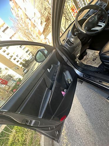 Kia: Kia Sportage: 2 l | 2011 il Universal — 10