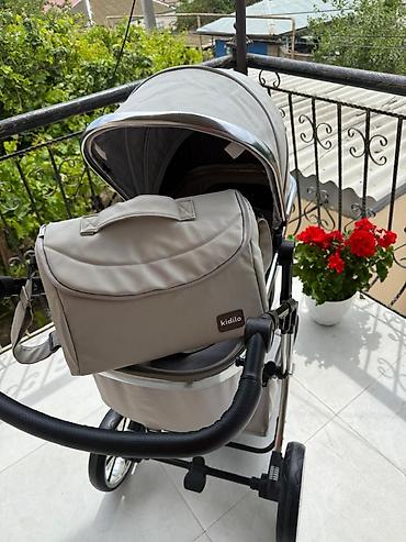 Modullu arabalar: Kidilo brendinin G10 modeli beşik tipli uşaq arabası. Bu araba — 4