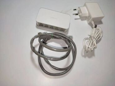 пассивное сетевое оборудование lucom: Коммутатор D-Link DES-1005C /B1A 5-port Desktop Switch (5UTP, 100Mbps)