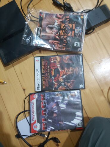 1 otaqlə mənzil: Play station 2 sumqayıtdadır üstündə 30 40 oyun var cuzi prablemi var