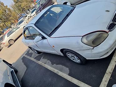 дэу матиз 1: Daewoo Nubira: 2001 г., 1.5 л, Автомат, Бензин, Седан — 5