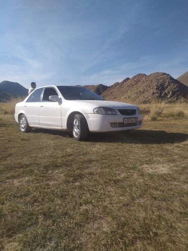 российские машины: Mazda 323: 2000 г., 1.5 л, Автомат, Бензин