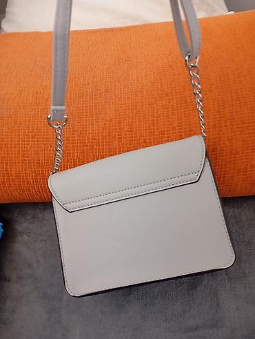 Putni koferi i torbe: Set torbi i tašni – više modela - Elegantna crna tašnica sa metalnim — 27