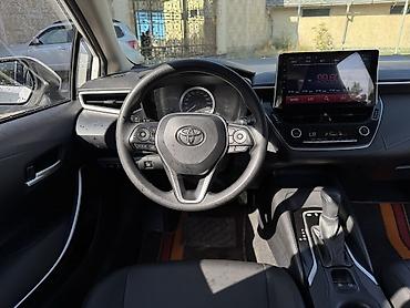 электро унаа: Toyota Corolla: 2022 г., 1.8 л, Вариатор, Гибрид, Седан — 7